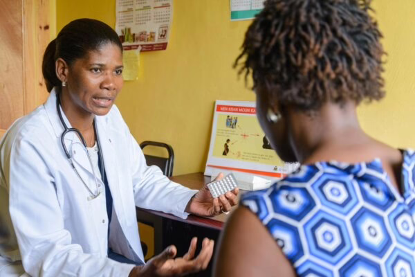 doctor explaining to a woman